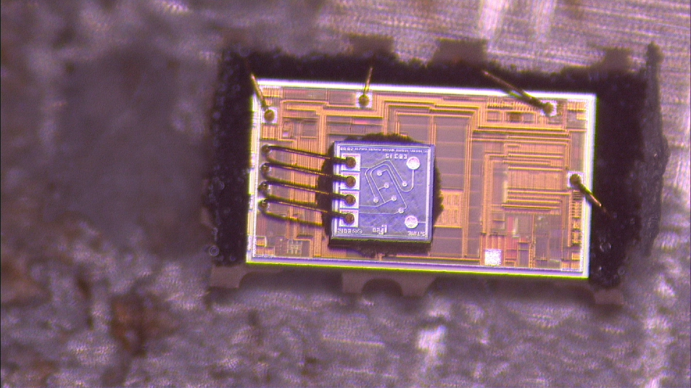 Die and bonding regions after decapsulation of a thin-aluminum-layer sample.